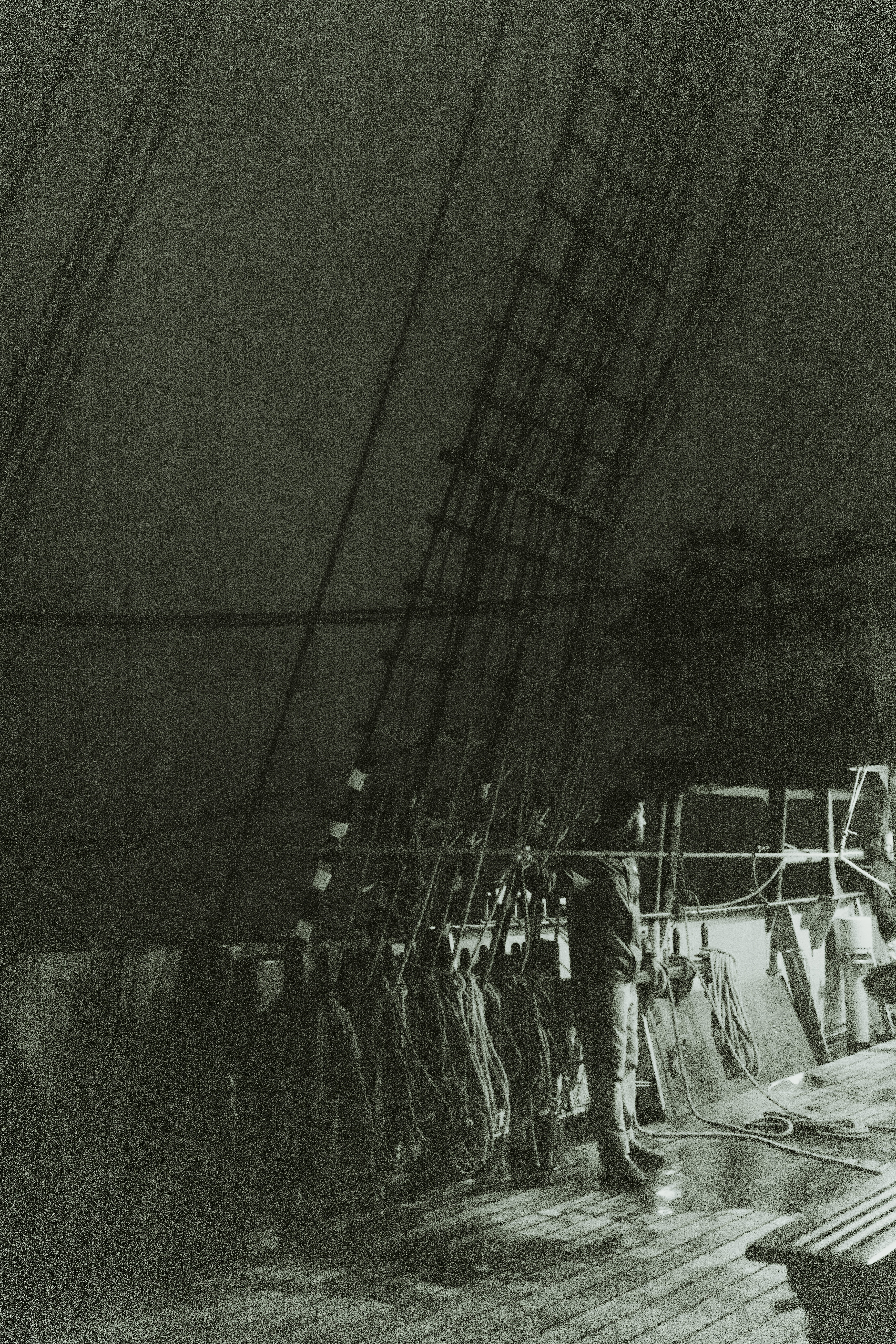 Night watch aboard Bark EUROPA — a lone figure on deck under the stars